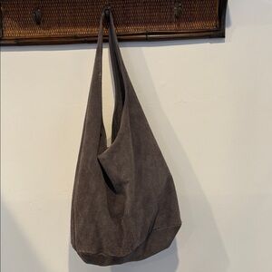 Suede slouch bag in grey. Never used